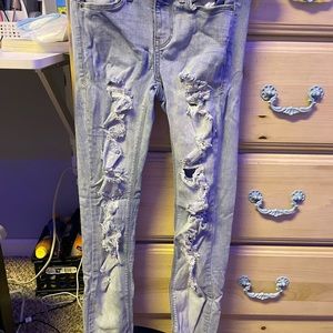 light blue ripped jeans